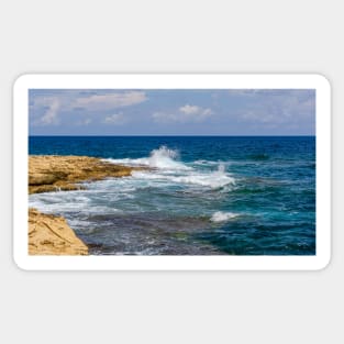 Wave and splashes on rocky Malta beach Sticker